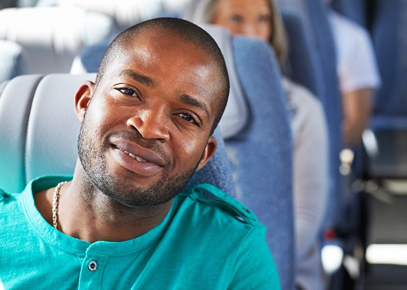 Guy riding a Scania bus